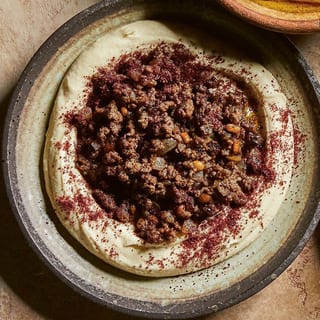 26 Hummus with Sautéed Lamb