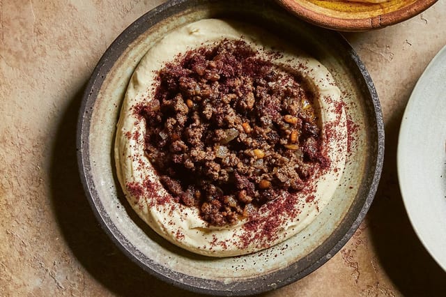 26 Hummus with Sautéed Lamb.